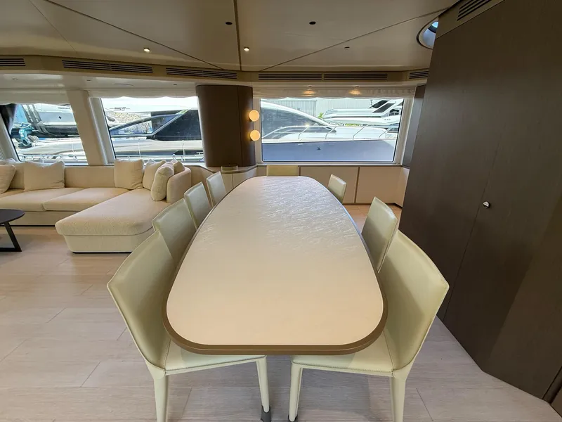 Slide: The Image of Luxurious interior of 2026 Azimut Magellano 25M yacht with dining area and seating. - 31