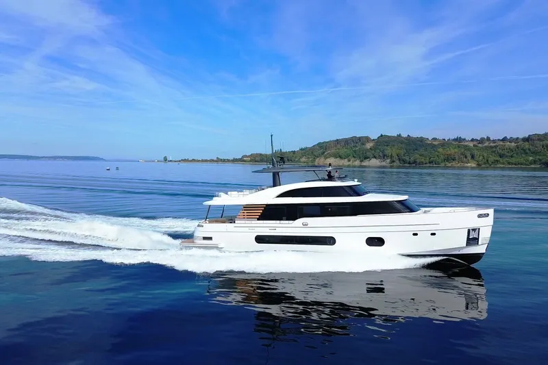 Slide: The Image of Luxury Azimut Magellano 25M yacht cruising on serene waters, 2026 model. - 107