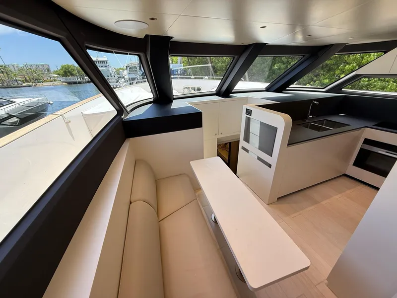 Slide: The Image of Interior of 2026 Azimut Magellano 25M yacht with seating and table. - 44