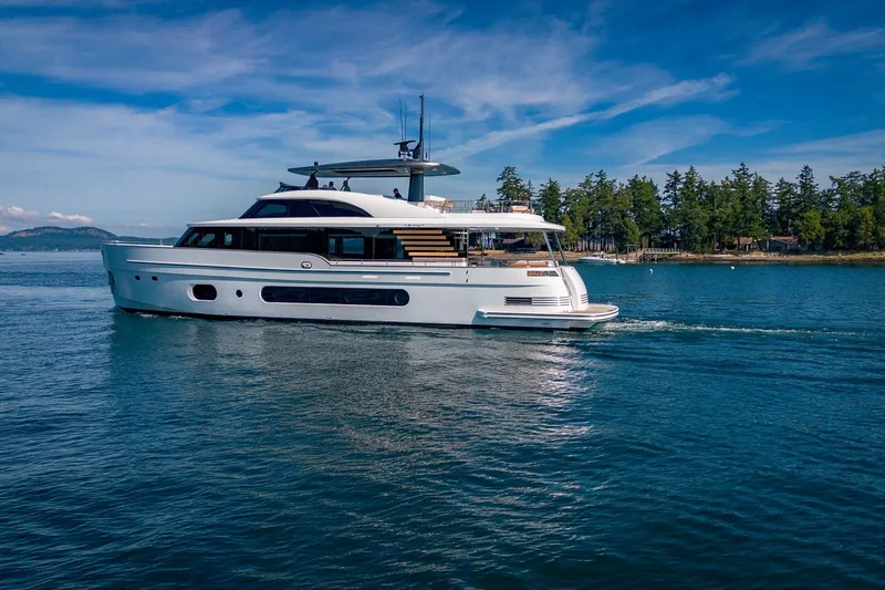 Slide: The Image of Luxury Azimut Magellano 25M yacht cruising on serene waters, 2026 model. - 99