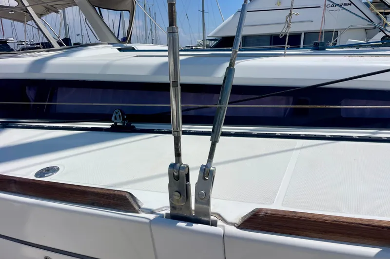 Slide: The Image of 2018 Beneteau Oceanis 48 yacht deck with rigging and sleek design. - 30