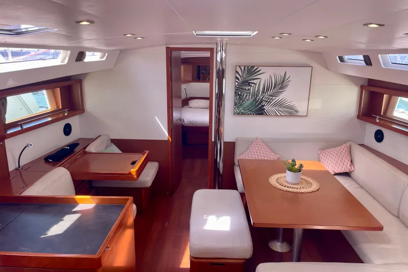 Slide: The Image of Luxurious interior of 2018 Beneteau Oceanis 48 yacht with elegant seating and decor. - 36