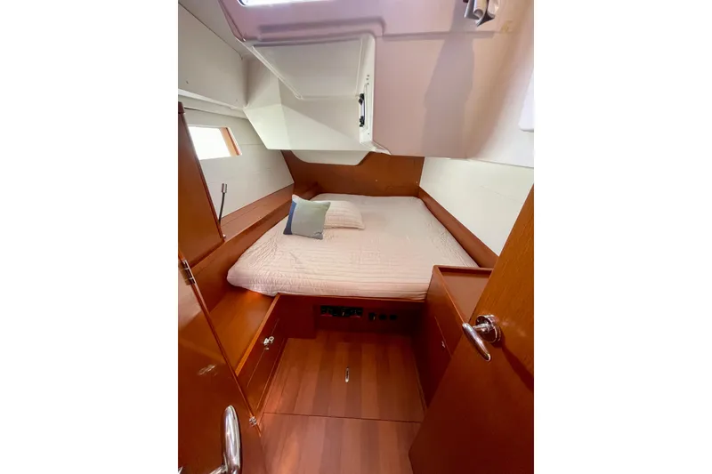 Slide: The Image of Cozy cabin interior of 2018 Beneteau Oceanis 48 yacht with wooden finish. - 44