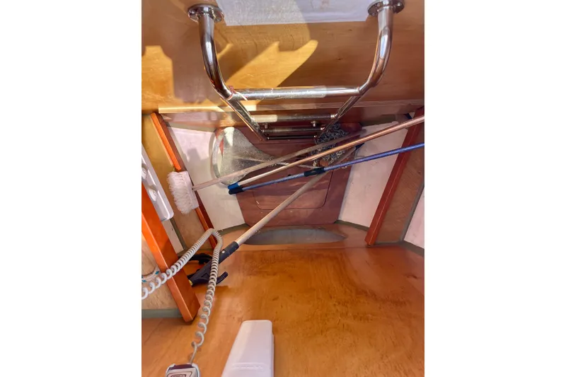 Slide: The Image of Interior view of 2018 Beneteau Oceanis 48 sailboat with ladder and cleaning tools. - 5