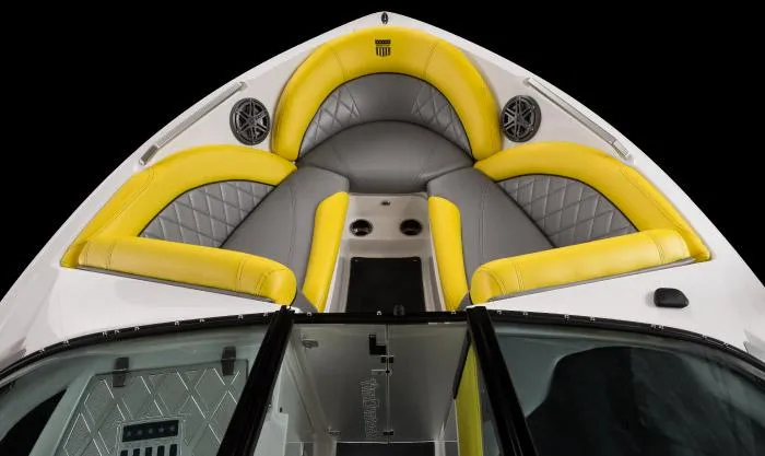Slide: The Image of Manufacturer Provided Image: 2015 MasterCraft X10 boat interior with yellow and gray seating. - 14