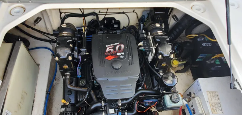 Slide: The Image of Engine compartment of a 2003 Wellcraft 2400 Martinique with MerCruiser 5.0 MPI engine. - 28