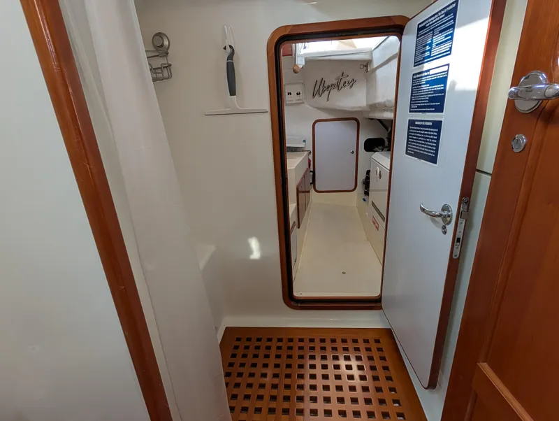 Slide: The Image of Engine room of 2015 Outbound 46 yacht with storage and equipment. - 26