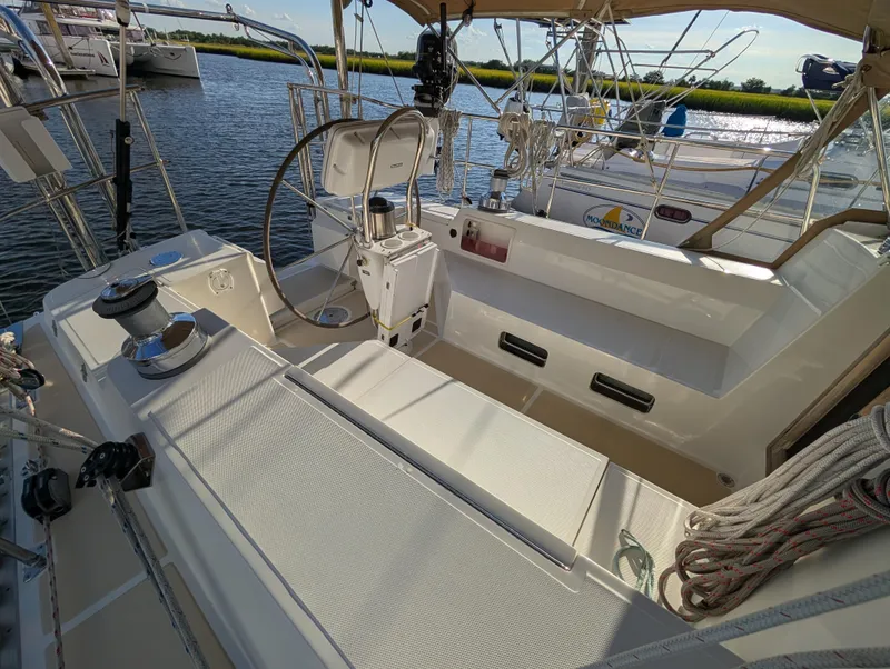 Slide: The Image of Cockpit view of a 2015 Outbound 46 sailboat with navigation equipment. - 31