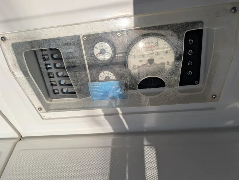 Slide: The Image of Interior of 2015 Outbound 46 sailboat with storage, fire extinguisher, and cleaning supplies. - 37