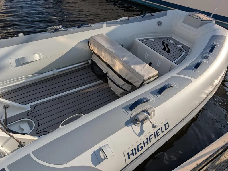 Slide: The Image of Sailboat "Ubiquitous" on turquoise water, Outbound 46 model, 2015, under a cloudy sky. - 77