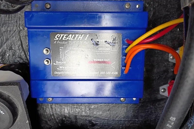 Slide: The Image of Blue Stealth I battery charger with colorful wires in a 2025 Yellowfin 24 CE boat. - 20