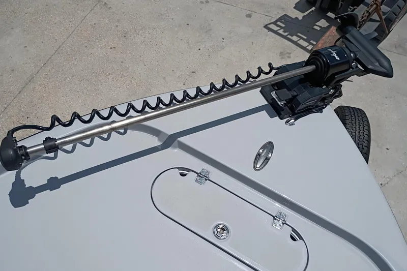Slide: The Image of 2025 Yellowfin 24 CE boat with trolling motor on deck, viewed from above. - 22