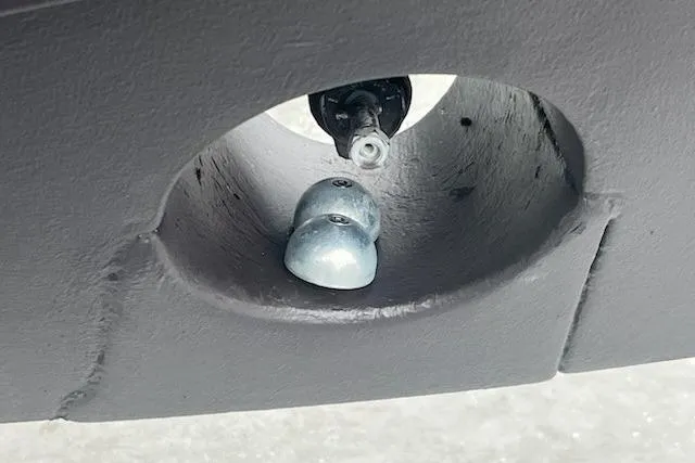 Slide: The Image of Close-up of a 2014 Beneteau Swift Trawler 34 hull detail with anodes. - 25