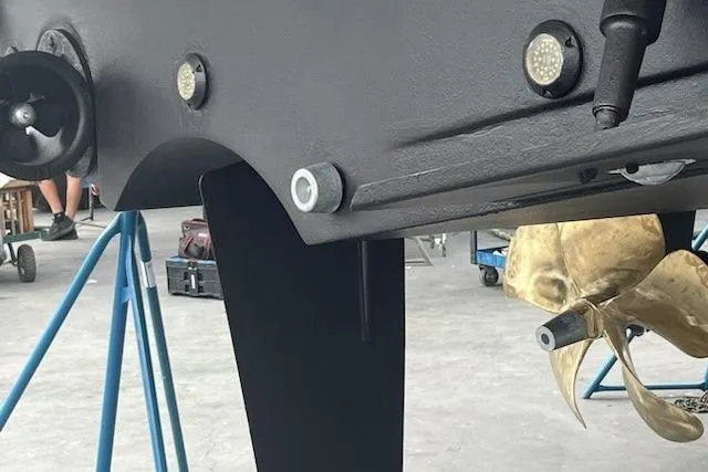 Slide: The Image of 2014 Beneteau Swift Trawler 34 hull and propeller detail in dry dock. - 26