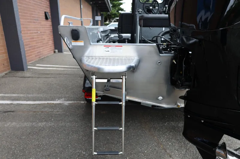 Slide: The Image of 2026 Thunder Jet 209 Rush Center Console with rear ladder and platform. - 13