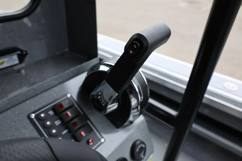 Slide: The Image of Close-up of 2026 Thunder Jet 209 Rush Center Console throttle controls. - 18