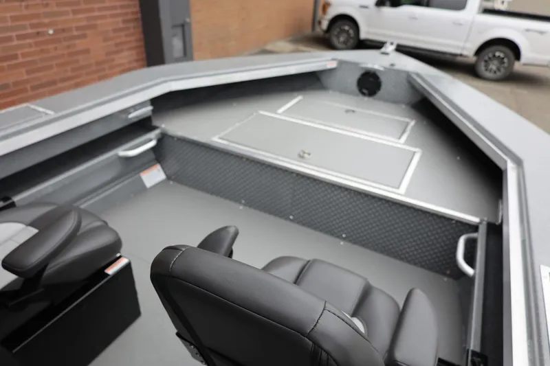 Slide: The Image of 2026 Thunder Jet 209 Rush Center Console interior with seating and storage compartments. - 21