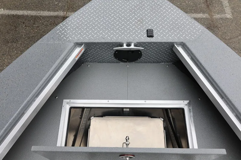 Slide: The Image of Bow view of 2026 Thunder Jet 209 Rush Center Console with storage compartment. - 23