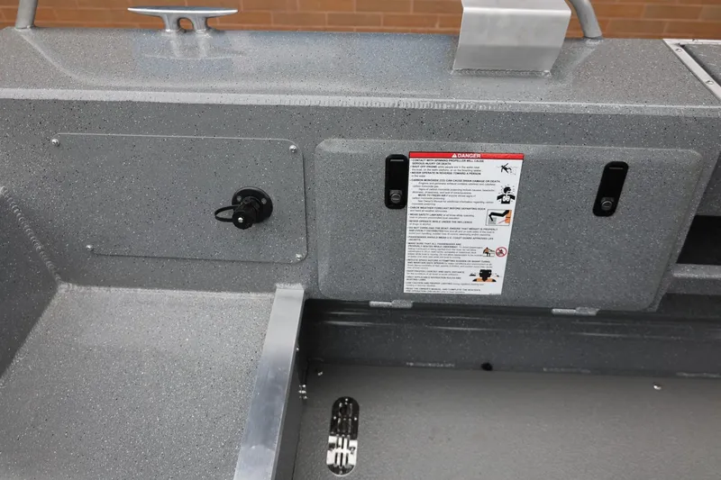 Slide: The Image of 2026 Thunder Jet 209 Rush Center Console interior with safety instructions and control panel. - 33