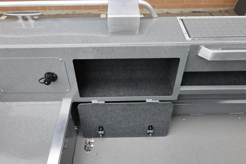 Slide: The Image of Thunder Jet 209 Rush Center Console 2026, featuring storage compartments and sleek design. - 34