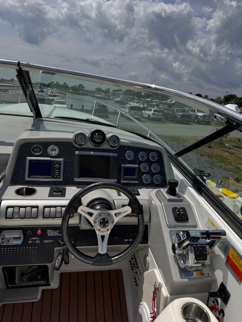 Slide: The Image of Kohler generator label on a 2009 Formula 350ss, showing specifications and safety warnings. - 17