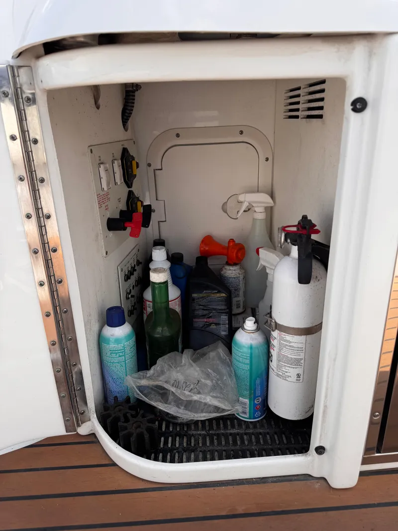 Slide: The Image of Luxurious interior of 2009 Formula 350 Sun Sport boat with plush seating and decorative pillows. - 22