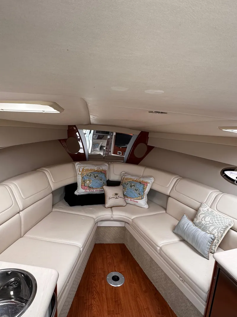 Slide: The Image of Cozy cabin interior of 2009 Formula 350 Sun Sport with tropical-themed bedding. - 30