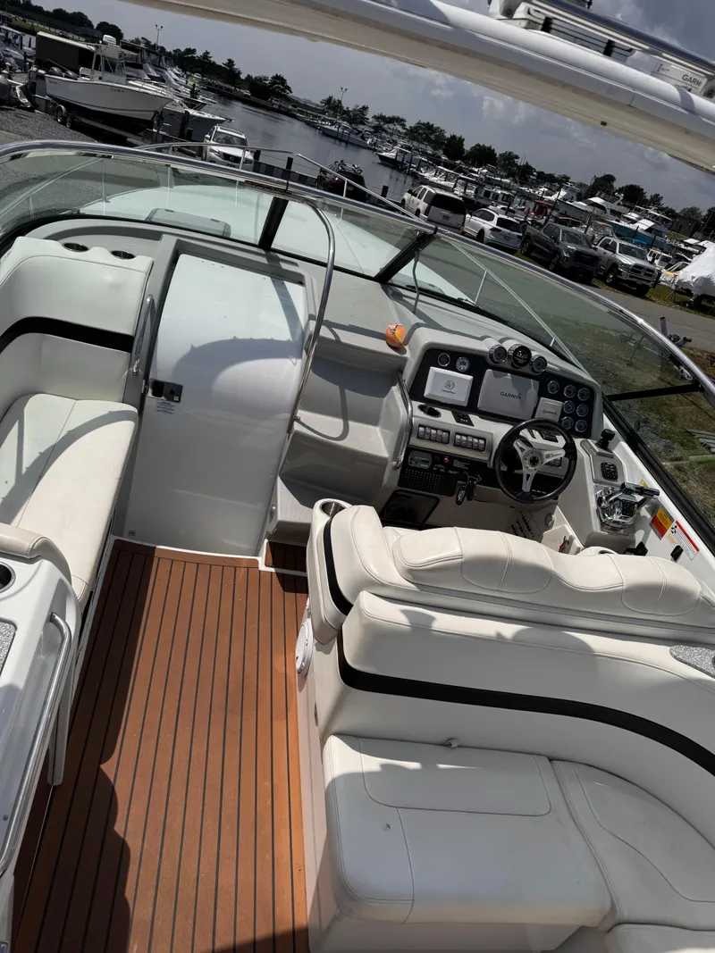 Slide: The Image of Dashboard of a 2009 Formula 350ss boat with navigation instruments and controls. - 9