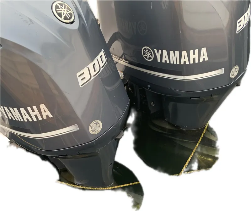 Slide: The Image of Twin Yamaha 300 outboard engines on a 2017 Robalo R302 Center Console boat. - 11