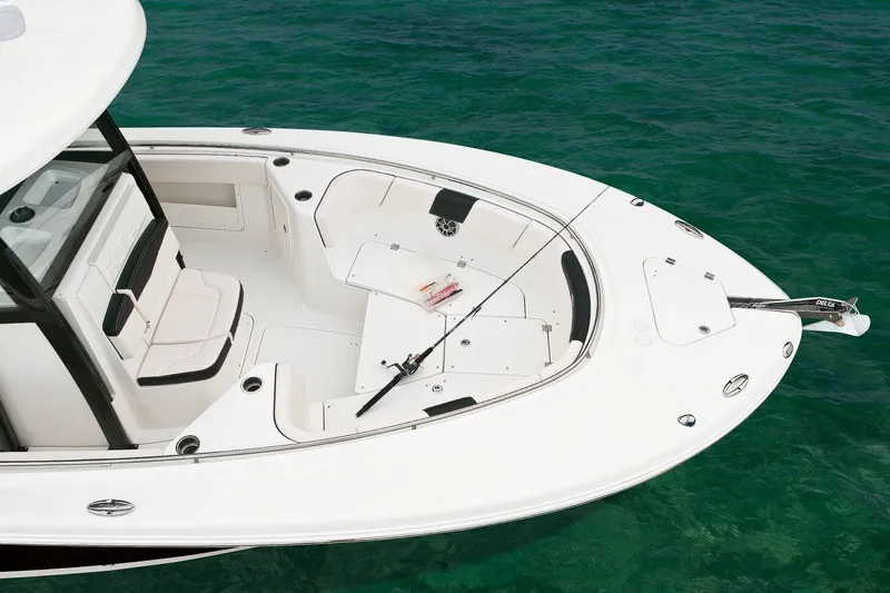 Slide: The Image of Manufacturer Provided Image: 2017 Robalo R302 Center Console boat on clear water. - 3