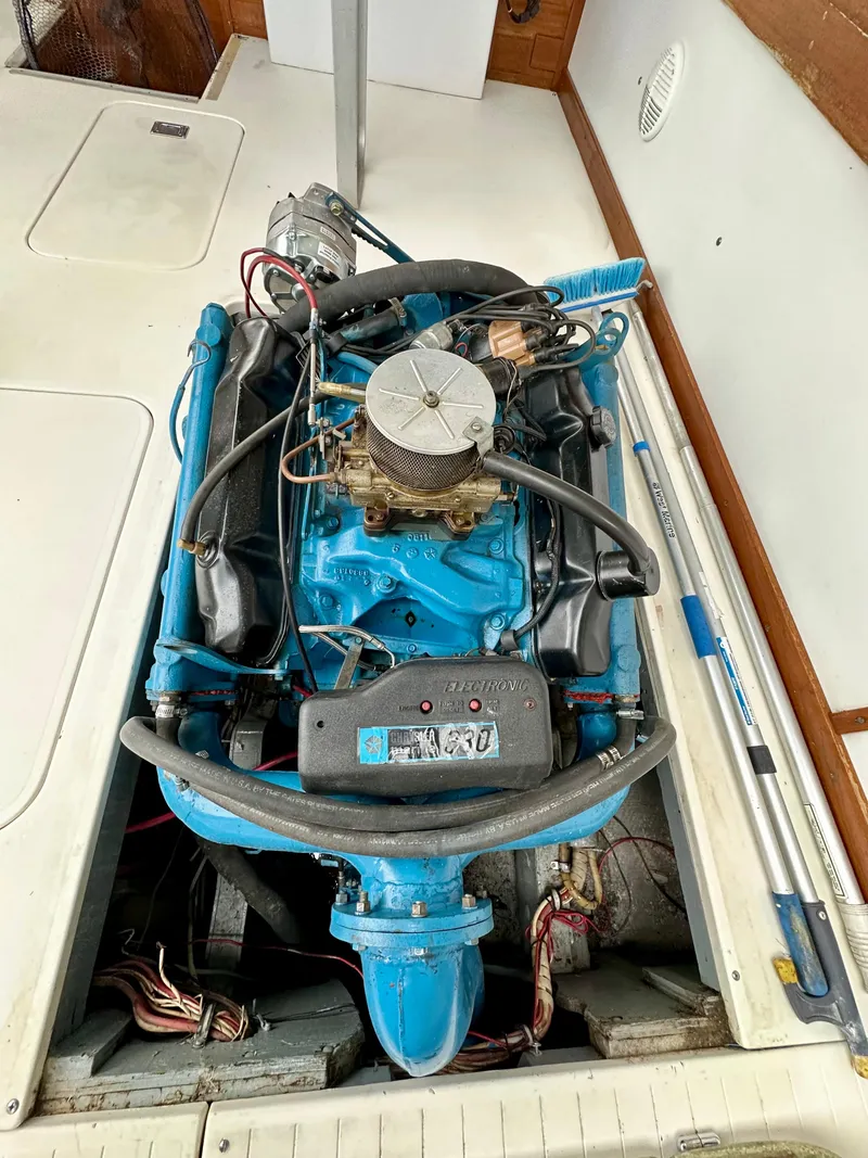 Slide: The Image of 1966 Bertram 31 Bahia Mar engine, blue, detailed view, boat interior. - 9