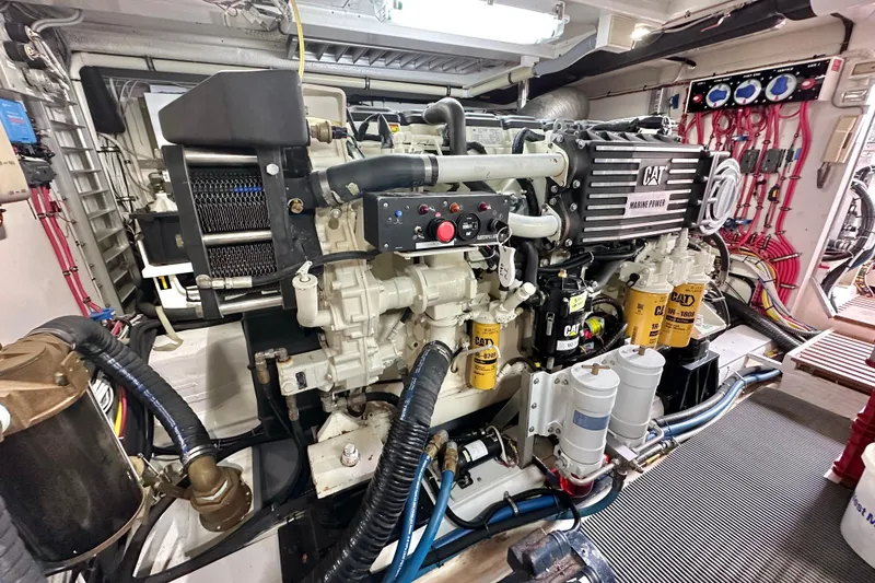 Slide: The Image of Engine room of 2006 Grand Banks 72 Yachtfisher with CAT marine power engine. - 48