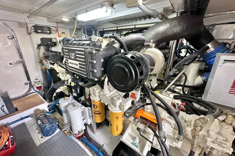 Slide: The Image of Engine room of 2006 Grand Banks 72 Yachtfisher with CAT marine power system. - 48