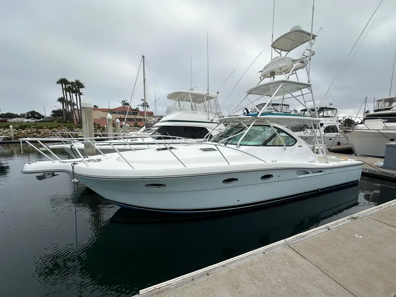 Slide: The Image of 2007 Tiara Yachts 3600 docked in a marina, showcasing sleek design and modern features. - 1