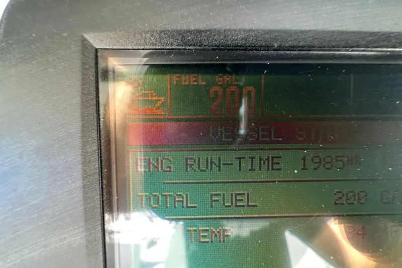 Slide: The Image of Display screen of 2007 Tiara Yachts 3600 Open showing fuel and engine runtime. - 26