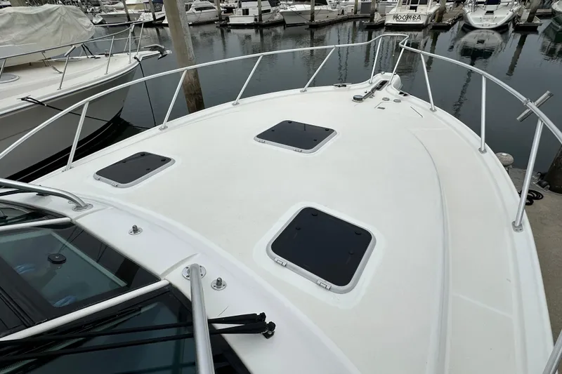 Slide: The Image of 2007 Tiara Yachts 3600 boat deck with hatches, docked in marina. - 5