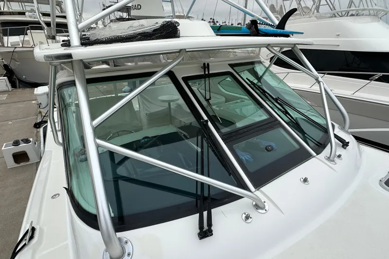 Slide: The Image of 2007 Tiara Yachts 3600 boat with sleek windshield and sturdy frame at marina. - 6