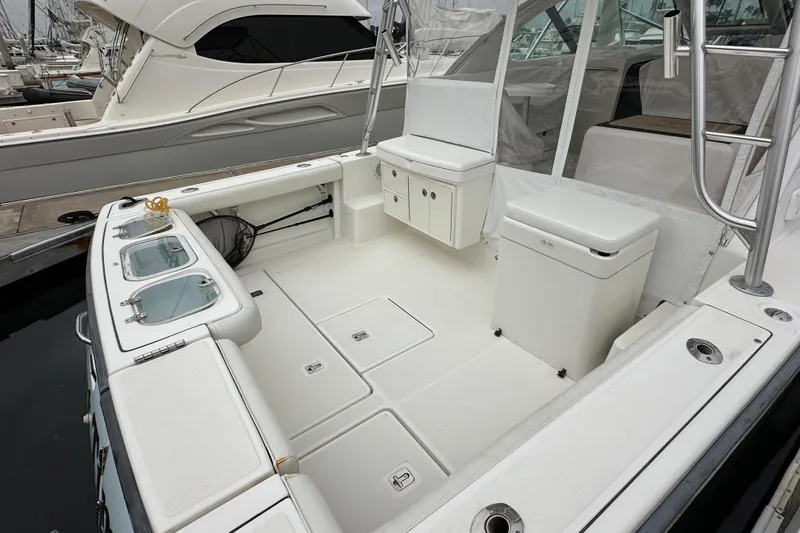 Slide: The Image of 2007 Tiara Yachts 3600 boat interior with seating and storage compartments. - 7