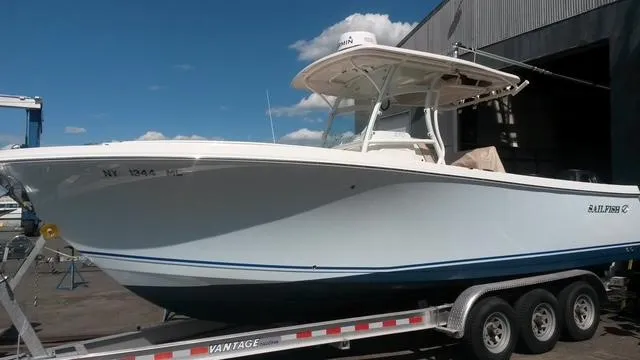 The Image of 2015 Sailfish 270 CC boat with people fishing on calm ocean waters. - 0