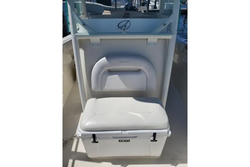 Slide: The Image of 2015 Sailfish 270 CC boat with rod holders and livewell setup. - 12