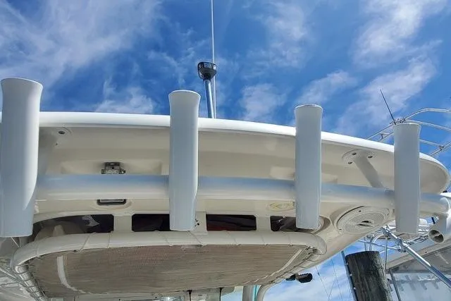 Slide: The Image of 2015 Sailfish 270 CC boat interior with cushioned seating and storage compartments. - 9