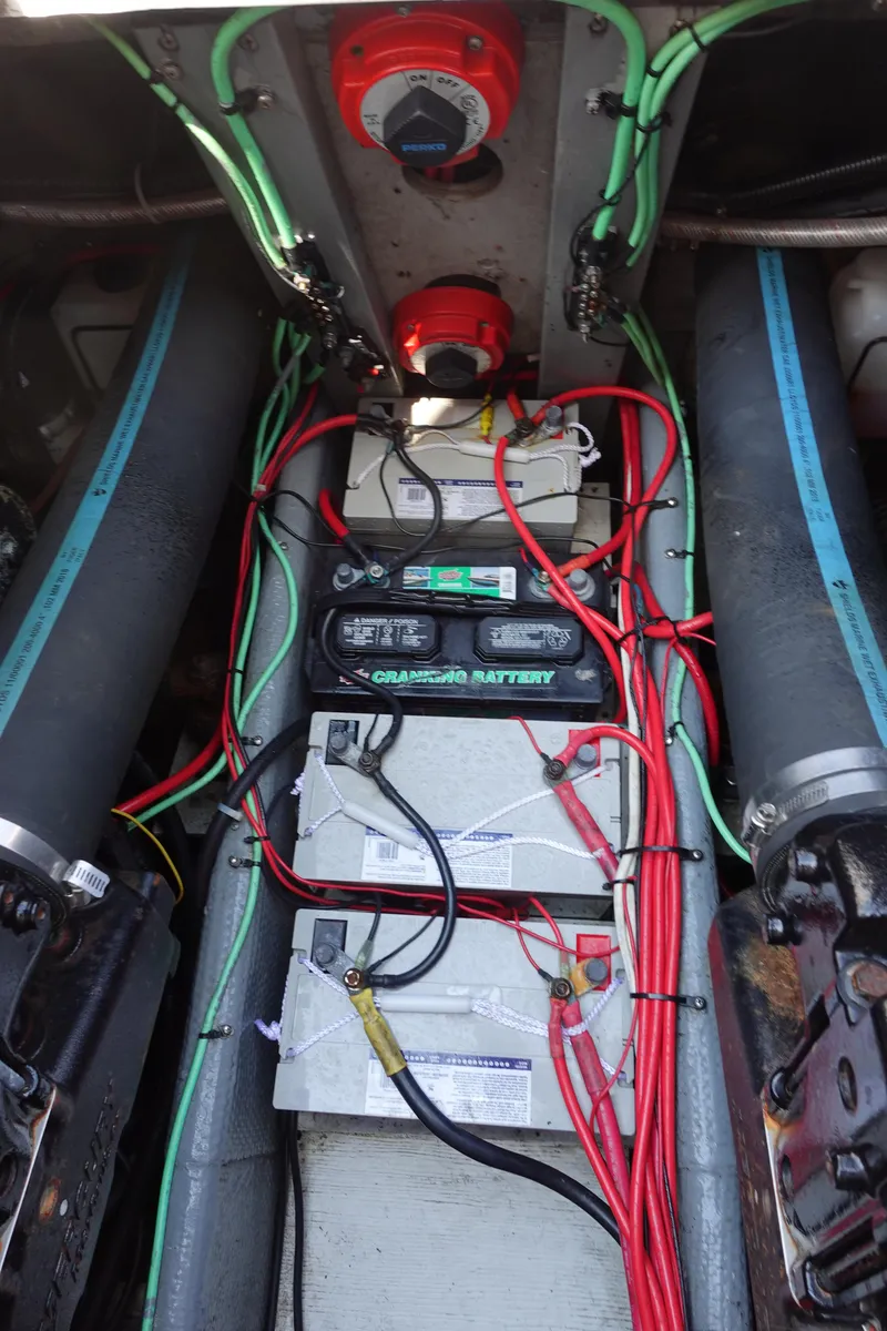 Slide: The Image of Engine compartment of 1988 Pacemaker 308 with batteries and wiring. - 20