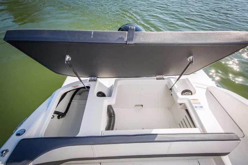 Slide: The Image of Manufacturer Provided Image: Open storage compartment on a 2016 Sea Ray SPX 190 OB boat. - 11