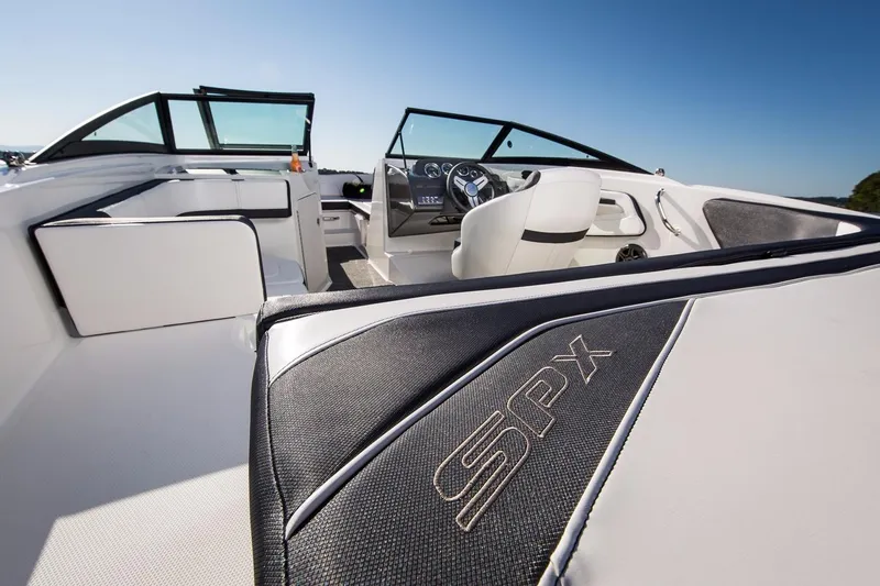 Slide: The Image of Manufacturer Provided Image: 2016 Sea Ray SPX 190 OB boat interior with steering console and seating. - 5