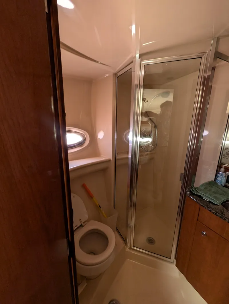 Slide: The Image of Bathroom interior of a 2006 Meridian 368 yacht with shower and toilet. - 11