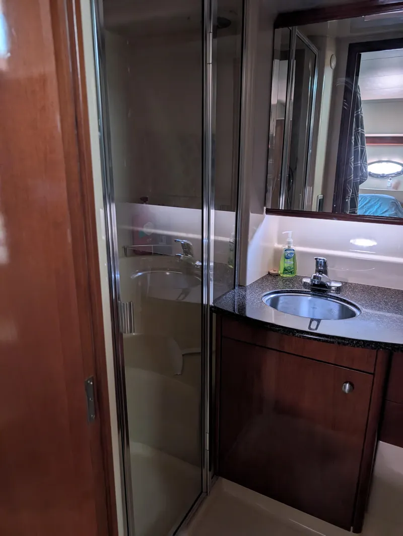 Slide: The Image of Bathroom interior of 2006 Meridian 368 yacht with sink and shower. - 14