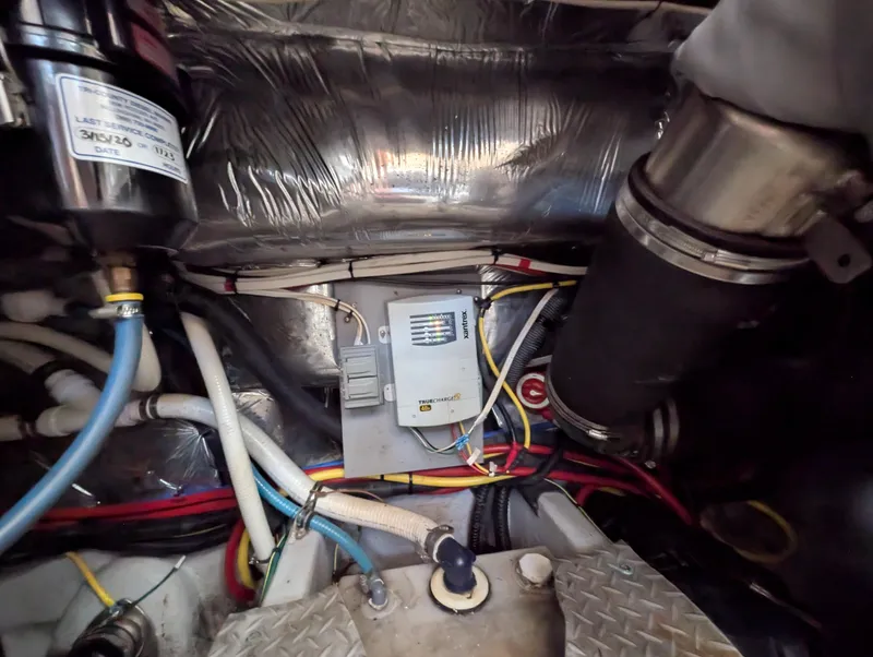 Slide: The Image of Engine compartment of a 2006 Meridian 368 with wiring and components. - 18