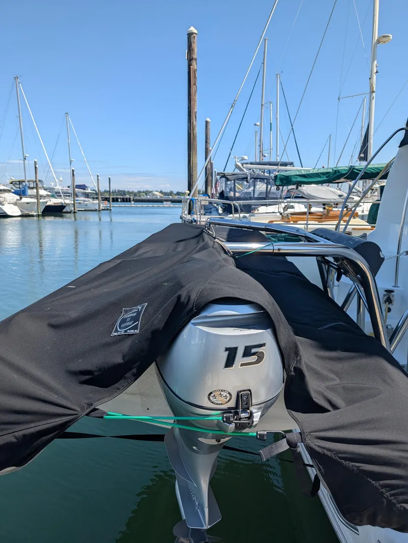 Slide: The Image of Outboard motor on a 2006 Meridian 368 yacht docked at a marina. - 28