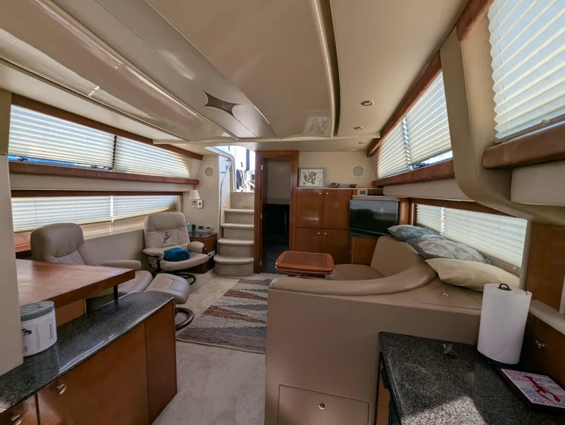 Slide: The Image of Luxurious interior of a 2006 Meridian 368 yacht with modern furnishings and ample natural light. - 6
