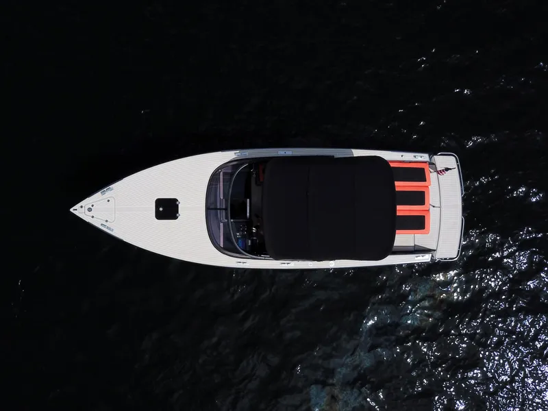 Slide: The Image of Aerial view of 2016 VanDutch 30 yacht on dark water. - 27